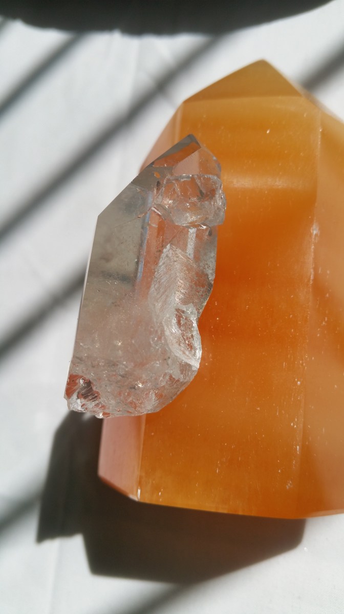 Orange calcite generator with manifestation quartz crystal at Heart of the Bay. Great for ...