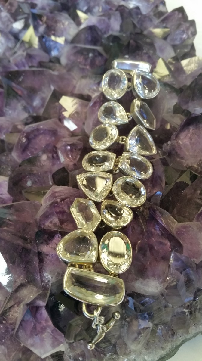 Jewellery cleansing on amethyst cluster at Heart of the Bay crystals Byron Bay